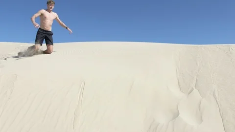 Man lost in desert, alone and thirsty, looks for a way back to civilisation Stock Footage 116361547