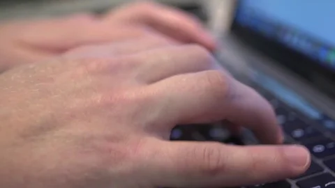 Man in Lounge Typing on Laptop 動画素材 83525294