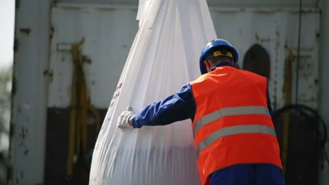 Man lowers the bag with the load down Video stock 93294043