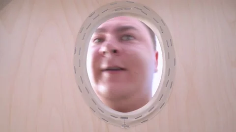 Man lowers his face down into the hole in the massage couch. A professional m Stock Footage 132923032