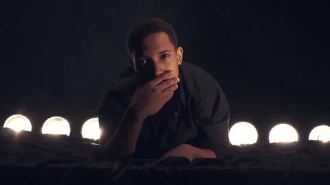 Man is lying on the bed Stock Footage 87458351