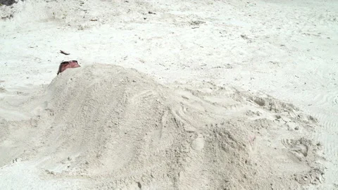 The man is lying covered with sand Stock Footage 91295758