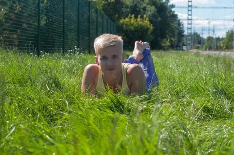 Man lying in a grass Stock Photos
