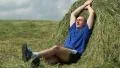Man lying on a haystack HD Footage