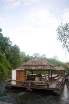 A man is lying on a large raft. Stock Photos
