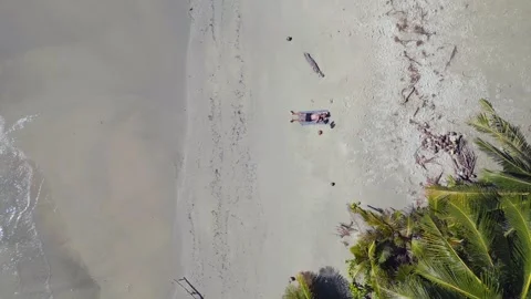 Man lying lonely alone dream beach thailand Perfect aerial top view flight drone Vidéo 243352052