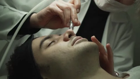 Man is lying on massage table and relaxing Stock Footage 137043119