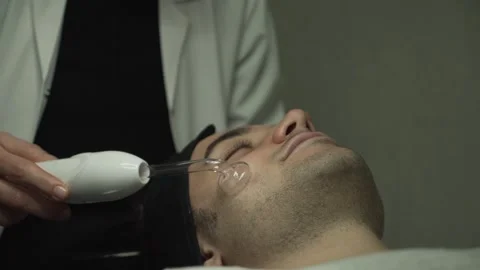 Man is lying on massage table and relaxing Stock Footage 137051918