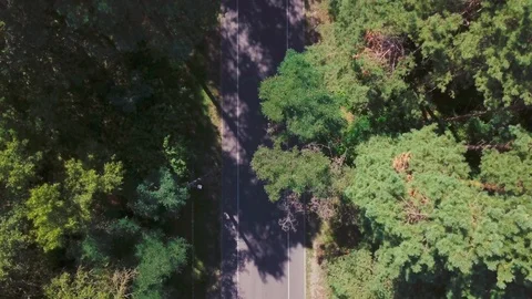 The man is lying on the road Video stock 94348349