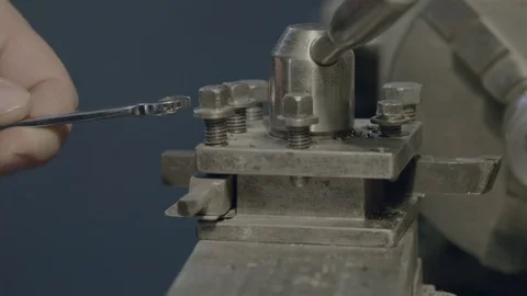 Man machine adjusts the turning position with open end wrench Stock Footage 81696763