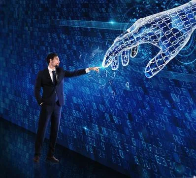 Man machine interaction between human and a digital hand Stock Photos