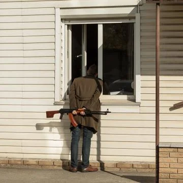 Man with machinegun Stock Photos