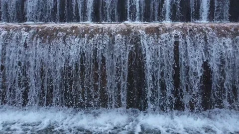 Man made beautiful large waterfall with many stairs. Stock Footage 232414829