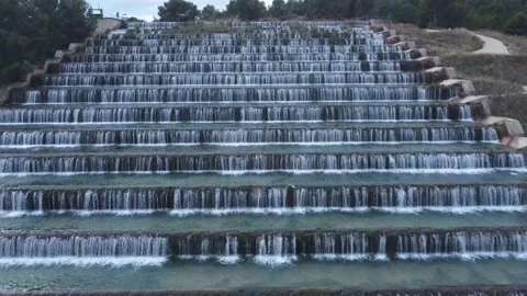 Man made beautiful large waterfall with many stairs. Stock Footage 232414972
