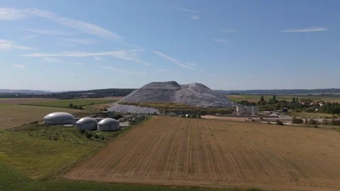 Man Made Salt Mountain Beside Biogas Facility Aerial 스톡 동영상 342861124