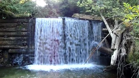 Man-made Waterfall in Forest Stock Footage 290416535