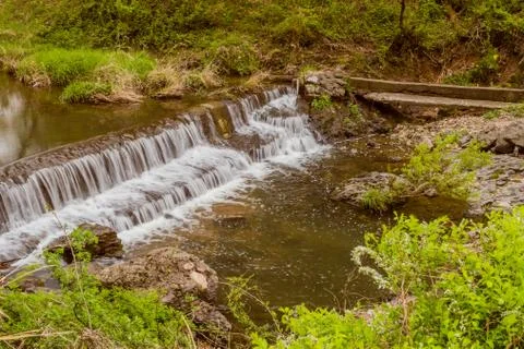Man made waterfall in river. Stock Photos