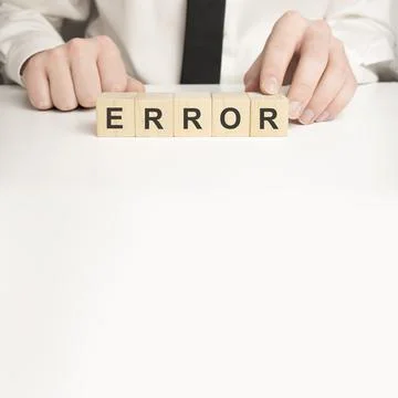 Man made word errors with wood blocks Foto stock