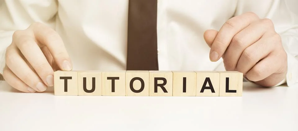 Man made word TUTORIAL with wood blocks Stock Photos