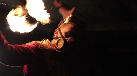 A man  make a fire performance Stock Footage 45349338