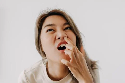 Man make funny teasing face for humor isolated on white. Stock-Fotos