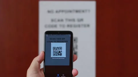 Man makes an appointment by scanning QR code. 스톡 동영상 161084992