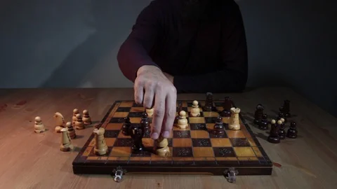 A man makes checkmate with the Queen Stock Footage 117037492