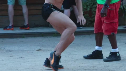 Man makes dance movements with legs and booty. Dance skills at the disco. Stock Footage 138108639
