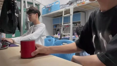 Man Makes Dice Rolling Trick with A Cup in Hefei, China Stock Footage 260067945