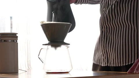 A man makes drip coffee. Video stock 169262825