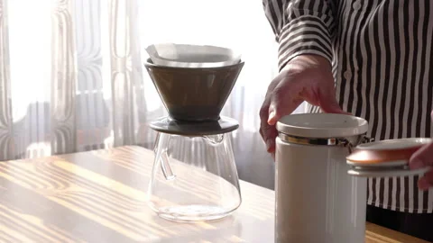 A man makes drip coffee. Video stock 169262832