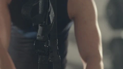 Man makes exercises for the biceps in the gym Stock Footage 48993111