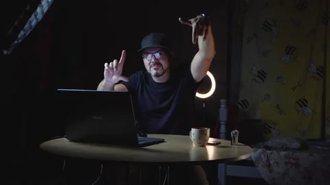 A man makes a frame with his hands 4K Stock Footage 320867633