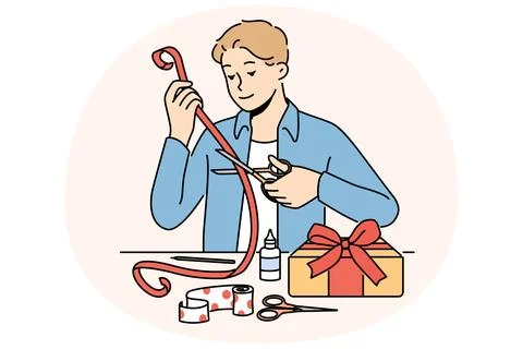 Man makes gift with own hands decorating box with red ribbon with festive paper. Stock-Illustration