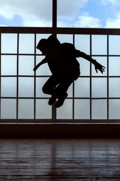 Man makes a jump in the dance. 스톡 사진
