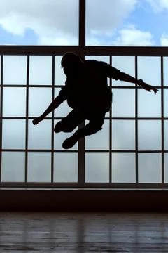 Man makes the jump. Stock Photos