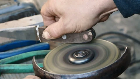 Man makes a knife, handmade Stock Footage 97654636