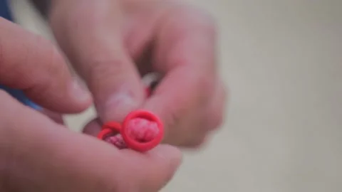 A man makes a knot Stock Footage 146685935