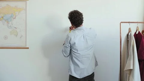 Man makes measurements with ruler Stock Footage 79043639