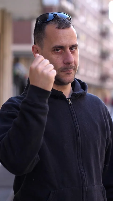Man makes money gesture with hands Stock Footage 308634652