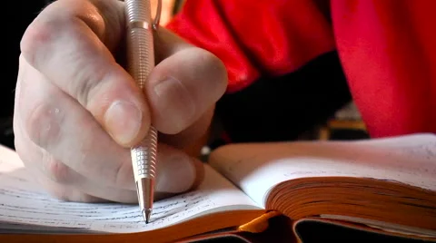 Man makes a note in notebook pen Stock Footage 68290440