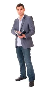 Man makes a note in notebook. Stock Photos