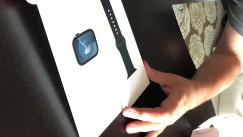 The man makes the open smart watch of the Apple Watch Series 9. Outdoing th.. Stock Footage 279738707
