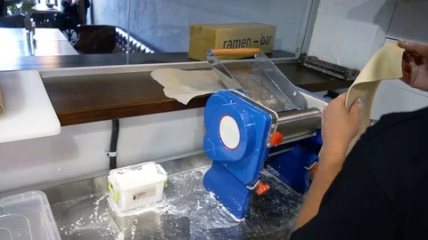Man makes pasta in a restaurant Stock Footage 122703043