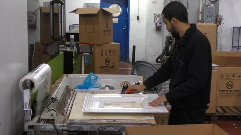 A man makes plastic parts in a settlement in Samaria 스톡 동영상 101489018