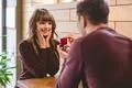 The man makes a proposal to his girlfriend in the restaurant Photo