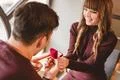 The man makes a proposal to his happy girlfriend Photo