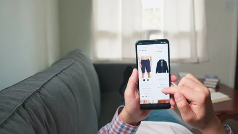 Man makes purchases on the Internet using a smartphone. Stock Footage 238647194