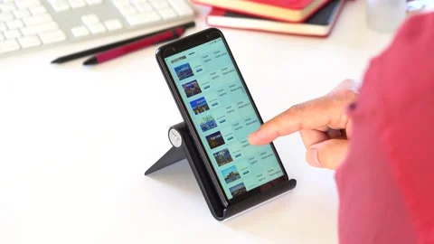 A Man makes a reservation while surfing the internet. Paris City Vidéo 145707360