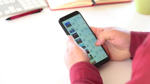 A Man makes a reservation while surfing the internet.  Stock Footage 145708949